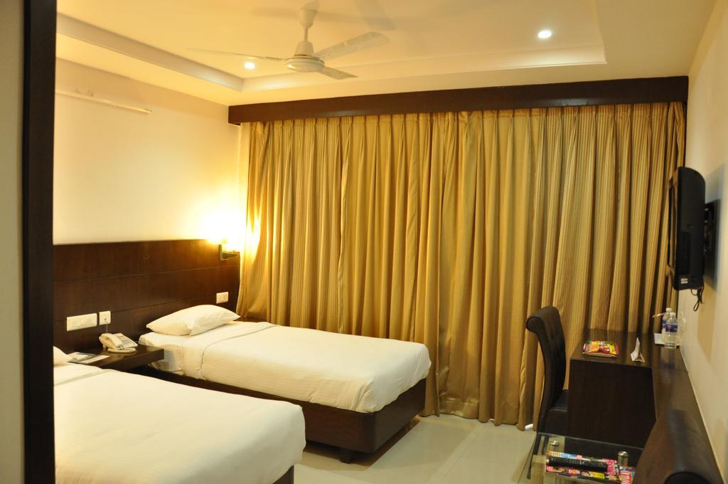 La Hospin Hotel Rājahmundry Habitación foto